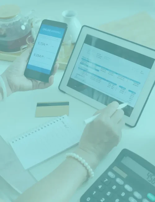 Accounts payable services represented by tablet and phone showing online bill pay